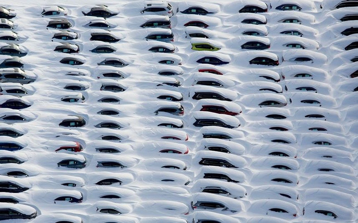 15 jonas Cars are buried in snow near Hamden, Connecticut