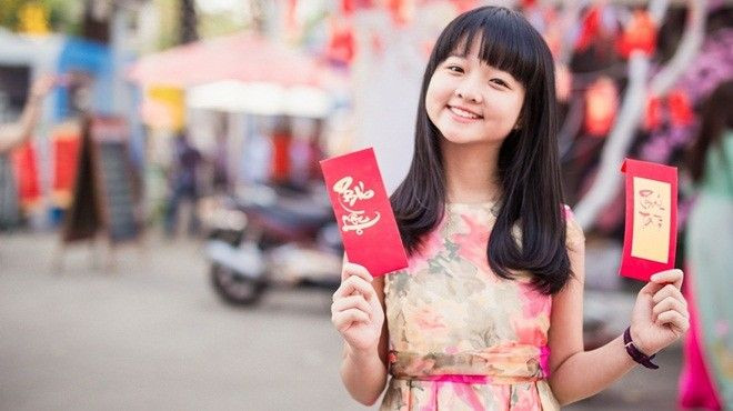 Sao nhí Lâm Thanh Mỹ diện váy hoa rạng rỡ xuống phố ngày đầu năm Ảnh 2