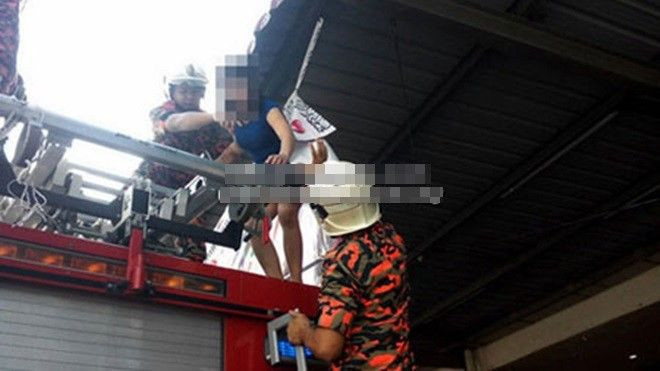 Malaysia giải cứu phụ nữ Việt định tự tử trên mái nhà Ảnh 2