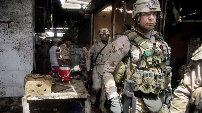 Đánh bom liên hoàn, máu chảy tràn đường phố Iraq Ảnh 2