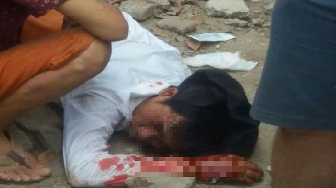 Bị đánh hội đồng vì cầm dao kề cổ vợ trên phố Ảnh 2