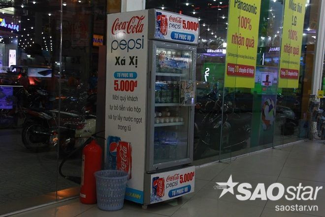 Xuất hiện máy bán nước đồng giá 5k kiểm tra độ trung thực của người mua Ảnh 2