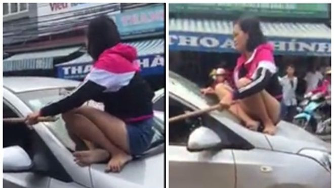 Hà Nội: Vợ cầm gậy trèo lên nóc xế hộp 'bắt sống' chồng ngoại tình với bạn thân Ảnh 2