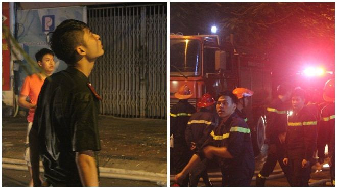 Lính cứu hỏa ướt sũng người dập tắt đám cháy phố Nguyễn Khang Ảnh 2