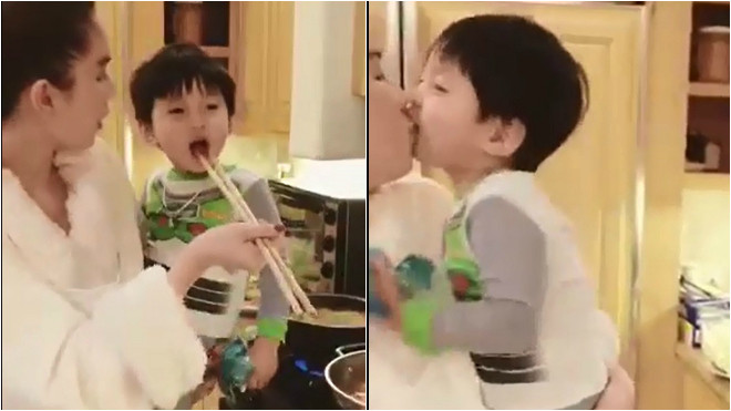 Clip: Ngọc Trinh âu yếm chơi đùa, hôn môi cháu trai tỷ phú 72 tuổi Hoàng Kiều Ảnh 2