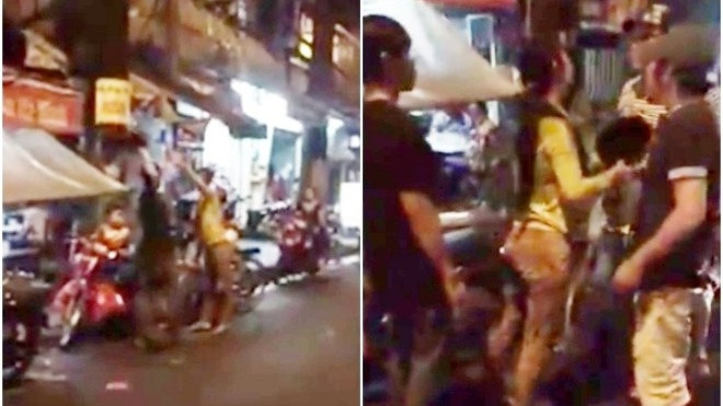 Chồng tát vợ trước mặt con nhỏ bị người đàn ông tức giận xông vào đánh giữa phố Ảnh 2