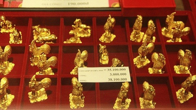 Giá vàng lao dốc trong ngày vía Thần Tài, mua xong bước ra khỏi cửa đã lỗ Ảnh 2