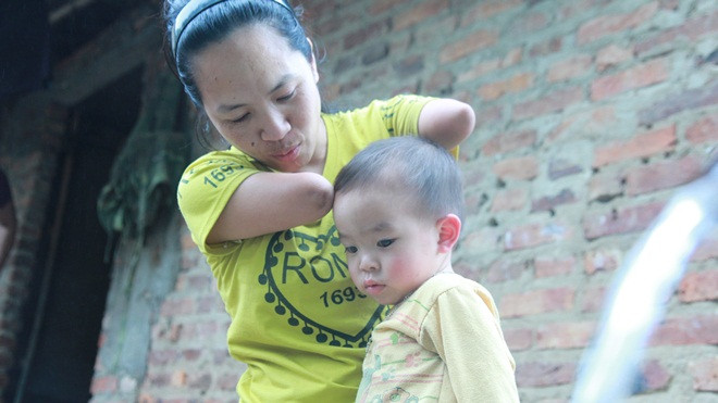 Người phụ nữ khuyết tật đơn thân nuôi con: 'Dị nghị của người đời không cản được khát khao làm mẹ của tôi' Ảnh 2