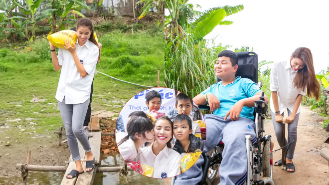 Phạm Hương giản dị đi dép tổ ong, bơm xe lăn cho trẻ em nghèo Ảnh 2
