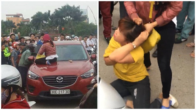 Hai phụ nữ trèo lên ôtô, dùng gậy đập cửa kính đánh ghen kinh hoàng ở Hà Nội Ảnh 2