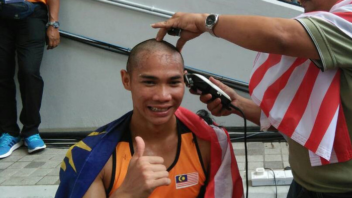 Câu chuyện cảm động đằng sau quả đầu “trọc lốc” của nhà vô địch SEA Games Ảnh 2