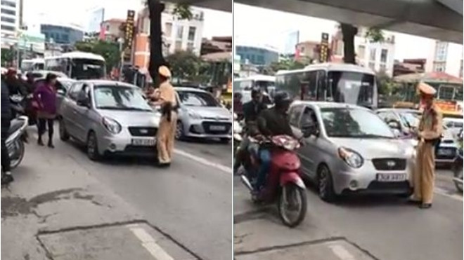 Lấy lý do bận việc, nữ tài xế quyết 'cố thủ' trên xe, nhấn ga đẩy CSGT đi xa 100m Ảnh 2