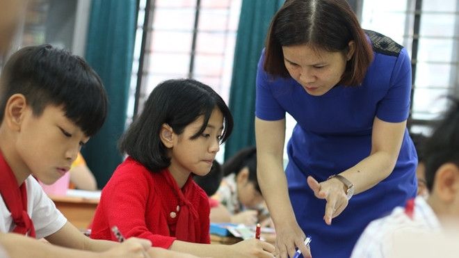 Sẽ miễn học phí tới cấp THCS Ảnh 2