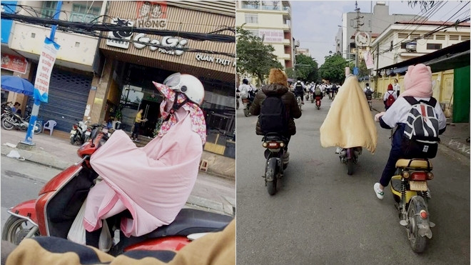 Những hình ảnh cực bá đạo trong ngày miền Bắc lạnh nhất từ đầu năm: Phủ kín chăn ấm khi ra đường, ngồi trong lớp học Ảnh 2