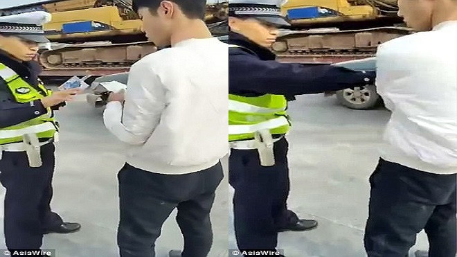 CLIP: 'Chết cười' với nam thanh niên ăn luôn cả bằng lái xe hòng đối phó cảnh sát Ảnh 2