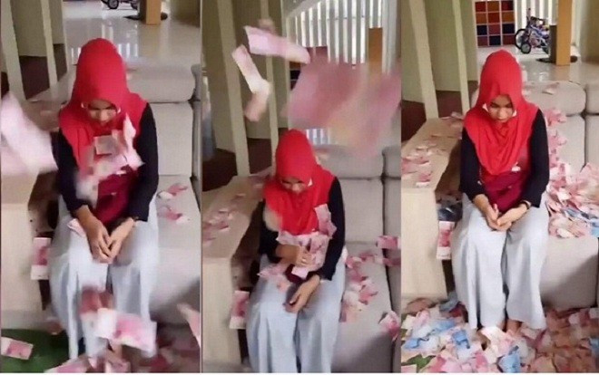 Giật chồng của bạn, cô gái trẻ bị trừng phạt bằng cách 'tắm' trong… đống tiền Ảnh 2