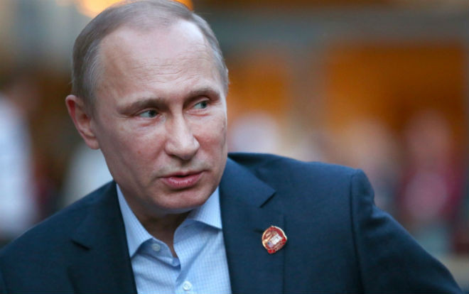 Tổng thống Putin qua 18 năm lãnh đạo Nga: Ngày càng trẻ trung và phong độ Ảnh 2