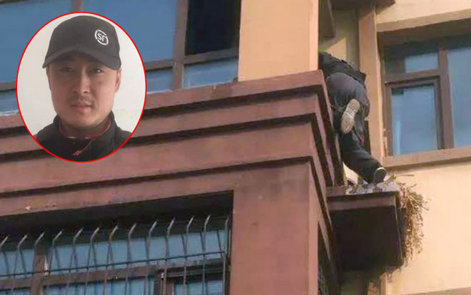 Cháy nhà, người đàn ông leo tay không như Spider-Man lên tầng 3 cứu người Ảnh 2