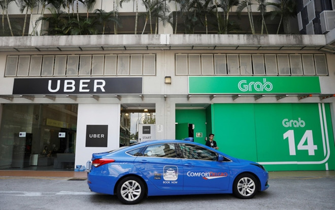 Trước ngày Uber sáp nhập vào Grab: Người tiêu dùng hoang mang, lái xe 2 hãng lo lắng chuyện độc quyền Ảnh 2