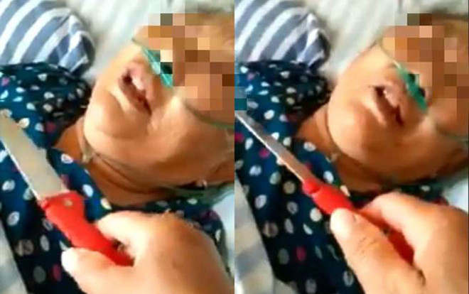 Con gái kề dao vào cổ mẹ già đang nằm viện gây phẫn nộ Ảnh 2