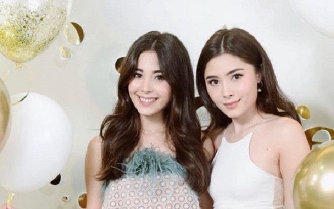 Xinh đẹp lại có gia thế 'khủng', cặp chị em sinh đôi người Thái được hâm mộ rần rần trên mạng xã hội Ảnh 2