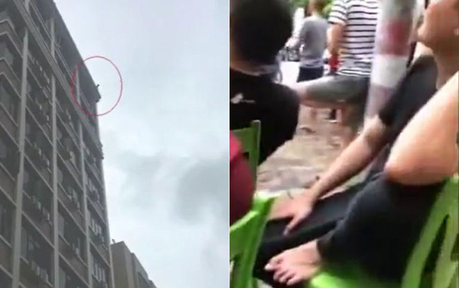 Thấy người nhảy lầu tự tử, dân hiếu kỳ xách ghế ra ngồi xem Ảnh 2