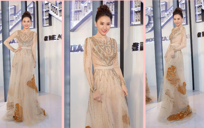 Đang 'mang bầu', Hari Won vẫn diện váy áo thướt tha như nữ thần, xuất hiện cùng trai lạ Ảnh 2