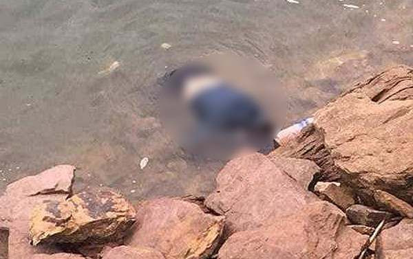 Tá hỏa phát hiện thi thể một phụ nữ trên hồ Kẻ Gỗ Ảnh 2