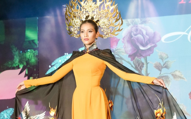 Trương Thị May nổi bần bật với áo dài tỏa sáng trên sàn diễn với vị trí vedette Ảnh 2