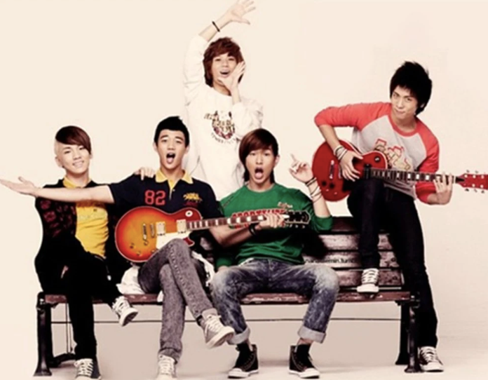 Người Photoshop tấm hình này không hiểu vì lý do gì đã xoá luôn phần chân của Taemin (SHINee). Ảnh: Koreaboo