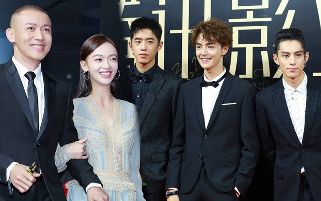 Thảm đỏ 'Tencent Films': Nhiếp Viễn tình tứ khoác tay, cầm váy Ngô Cẩn Ngôn - F4 của 'Tân vườn sao băng' đẹp rạng ngời Ảnh 2