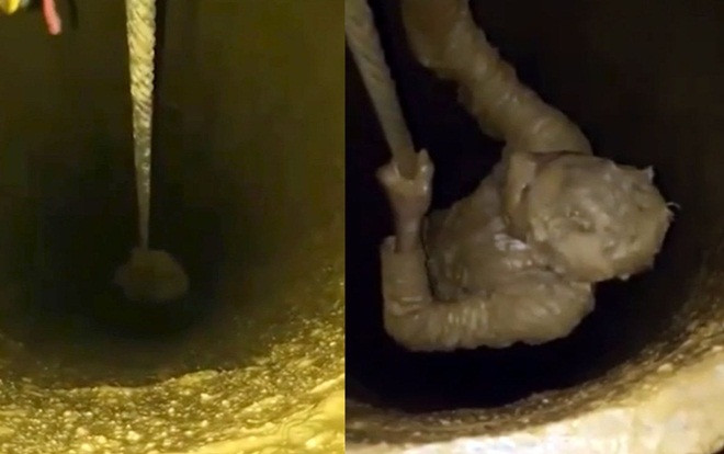 Đang đi bộ trên đường, bất ngờ rơi xuống hố bùn sâu 24 m Ảnh 2