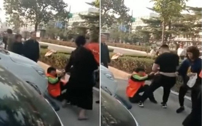 Cặp vợ chồng túm tóc, đẩy ngã lao công già vì cản con trai đi vệ sinh ngoài đường Ảnh 2