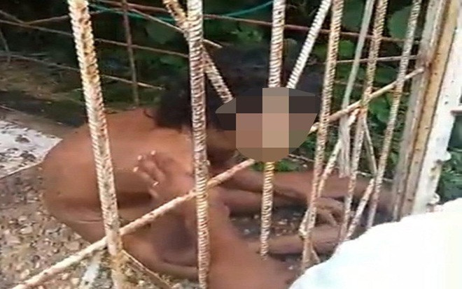 Phát hiện người phụ nữ không mảnh vải che thân bị gia đình nhốt trong lồng sắt suốt 15 năm Ảnh 2