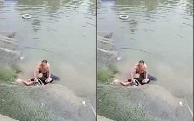 Cụ ông ghì chặt thiếu nữ dưới nước vì lý do khiến nhiều người cảm kích Ảnh 2