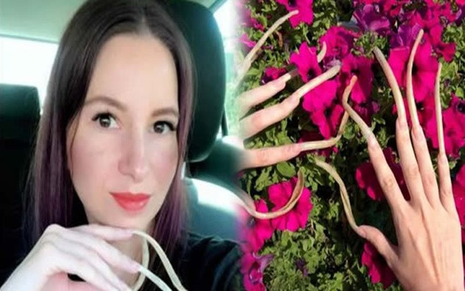 Dành 4 năm nuôi bộ móng tay dài 12 cm vì lời thách đố của bạn Ảnh 2