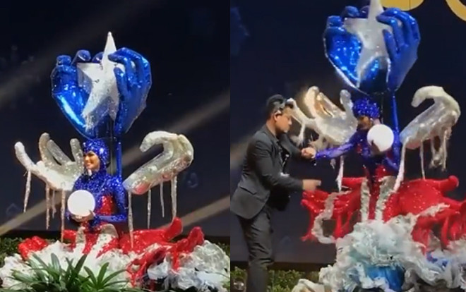 Pha ngã quỳ khôi hài của Miss Puerto Rico trên sân khấu trong phần thi trang phục dân tộc Ảnh 2