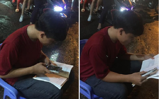 Ngày thi học kỳ cận kề, mặc dòng người đổ xuống đường 'đi bão' nam sinh tỏ ra điềm tĩnh ôn bài gây chú ý Ảnh 2