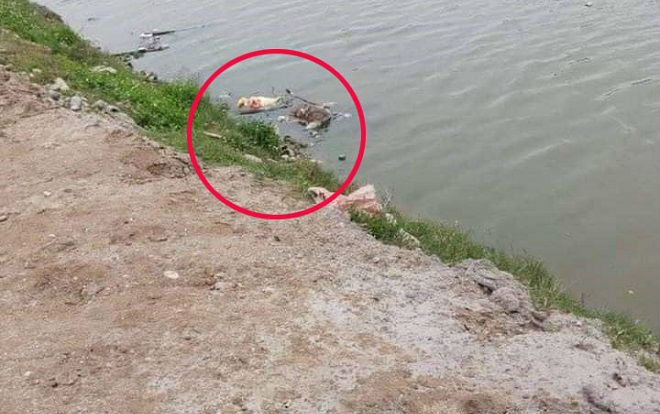 Phát hiện thi thể bị trói 2 tay đầu bịt kín túi nilon trên sông, không thể nhận diện vì phân hủy quá mạnh Ảnh 2