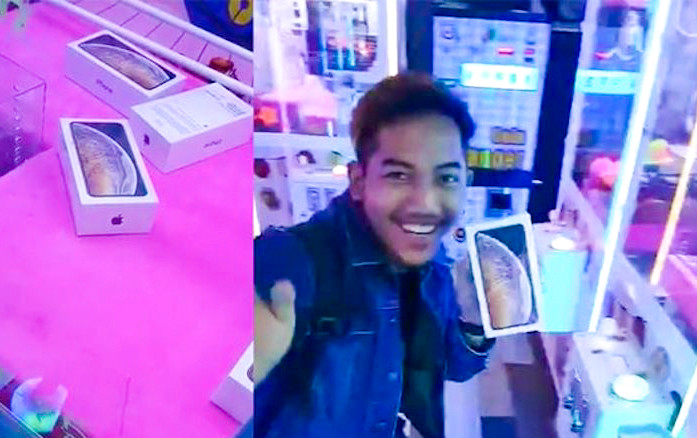 Chưa kịp mừng vì gắp trúng iPhone Xs, anh chàng này đã phải ngã ngửa khi thấy thứ bên trong Ảnh 2