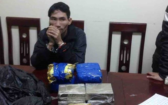 Đối tượng vận chuyển 8 bánh heroin bị tóm gọn dịp giáp Tết Ảnh 2
