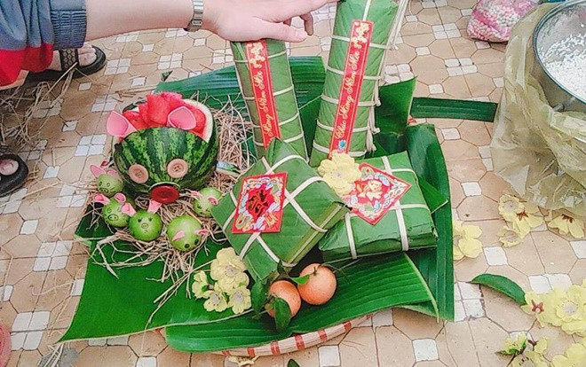 Cười bò với những kiểu bánh chưng tự gói 'muôn hình vạn trạng' đón Tết Nguyên đán Ảnh 2