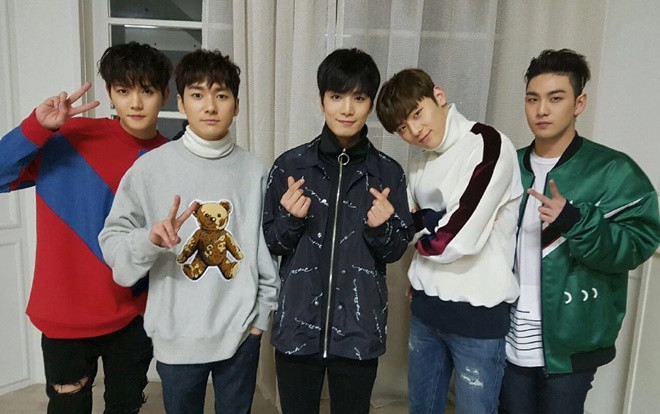 NU'EST tái ký hợp đồng và phản ứng gây bất ngờ của K-net Ảnh 2