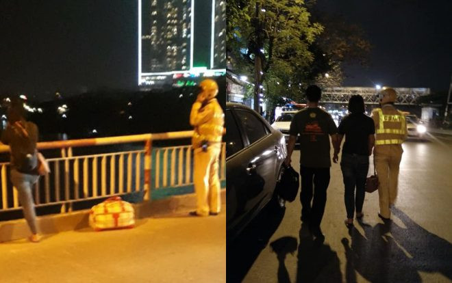 CSGT nhanh trí giải cứu người phụ nữ dí kéo vào cổ đòi nhảy cầu Chương Dương tự tử do mâu thuẫn vợ chồng Ảnh 2