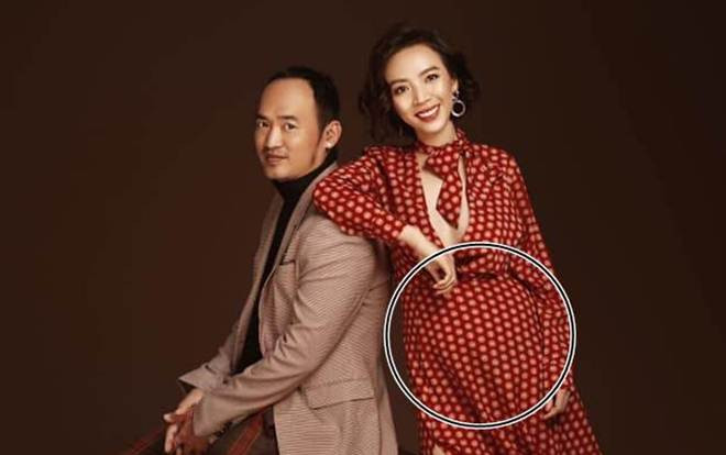 Thu Trang lộ vòng 2 to bất thường, rộ tin đồn năm nay sẽ có 'heo vàng' Ảnh 2