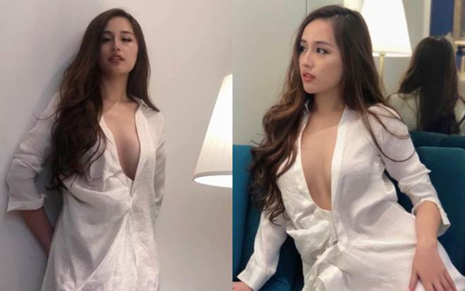 Vòng 1 tuyệt đẹp nên Mai Phương Thúy có sở thích buông lơi cúc áo hờ hững Ảnh 2