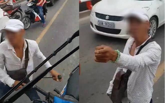 Người đàn ông nghi lao ra chặn đầu xe buýt yêu cầu lùi xe, nghênh ngang rút tua vít đòi đâm tài xế Ảnh 2