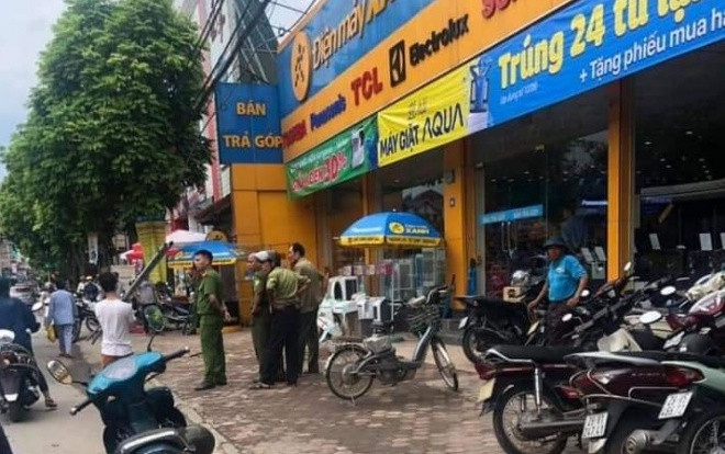 Danh tính nghi phạm cầm kiếm truy sát nhân viên bảo vệ Điện máy Xanh ngay trước cửa hàng Ảnh 2
