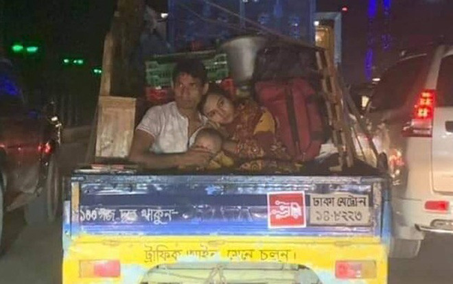 Bức ảnh cô gái tựa vai chồng sau xe tải cũ nát gây tranh cãi: Tình yêu đích thực hay sự thất bại của người đàn ông? Ảnh 2