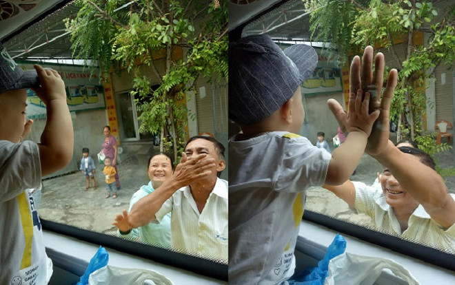 Hình ảnh ông bà ngoại bịn rịn chia tay cháu trai qua ô kính ô tô gây xúc động mạnh Ảnh 2